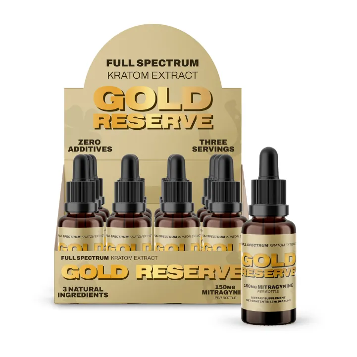 Display box of Gold Reserve full-spectrum kratom extract bottles, with a single bottle in front and gold branding reading GOLD RESERVE on labels and packaging.